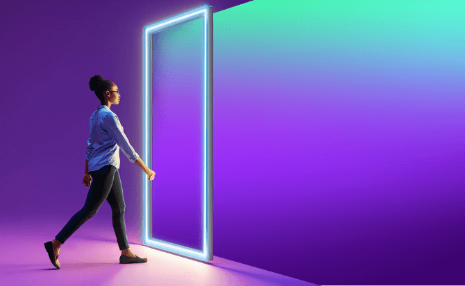 Woman walking through a bright doorway representing new possibilities